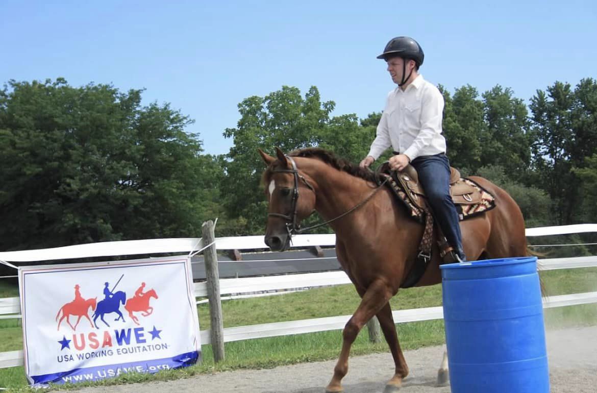 western rider with sign